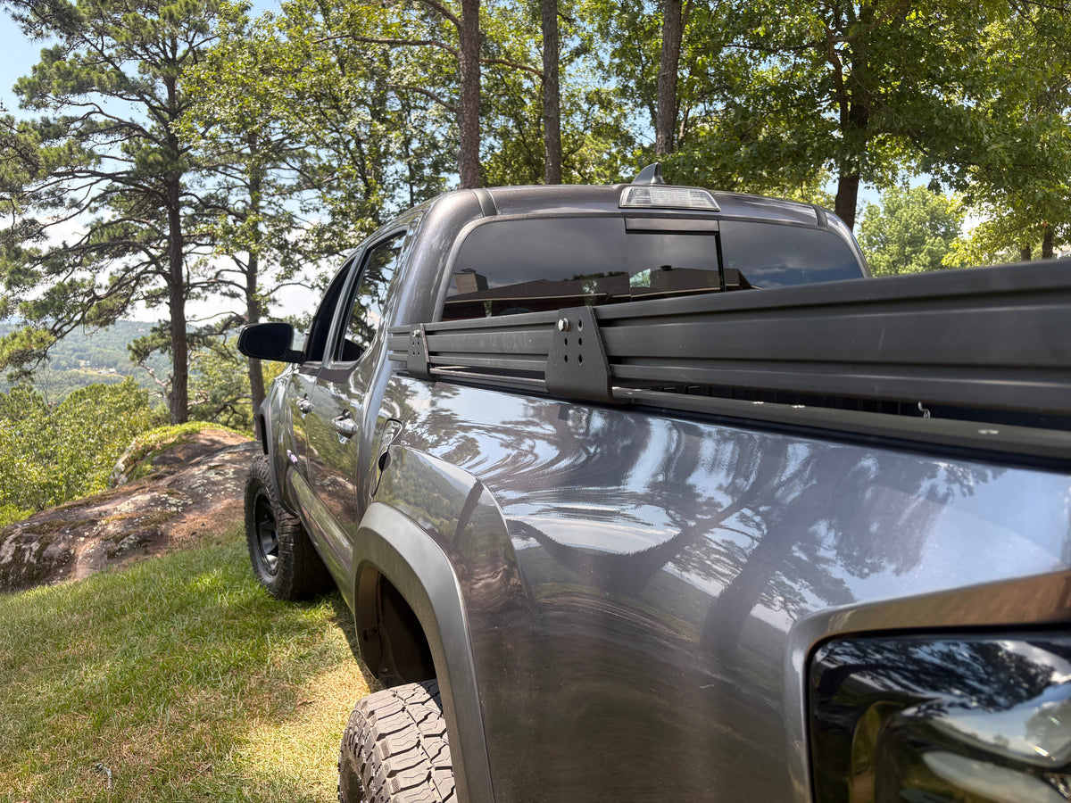 NDF-outfitting 3rd generation Toyota Tacoma truck bed rack with detachable rack rails that can be stored on the side, allowing full access to your truck bed.