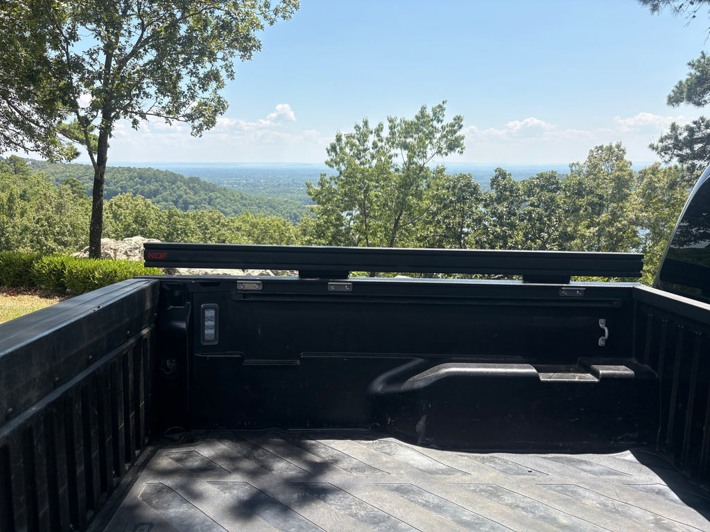 NDF-outfitting 3rd generation Toyota Tacoma truck bed rack With rack rails stored on the side out of the way allowing full access to your truck bed.