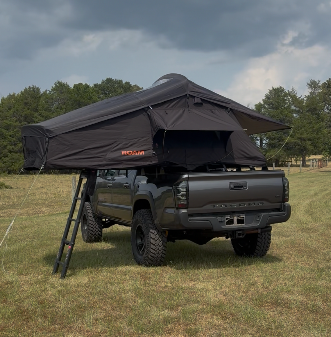 NDF-outfitting 3rd generation Toyota Tacoma truck bed rack with a roam vagabond rooftop tent mounted on top.